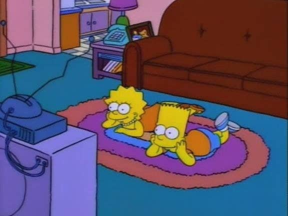 Bart and Lisa Simpson watching TV