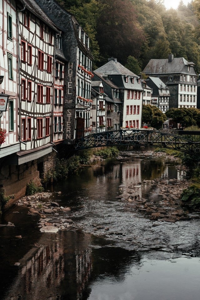 picturesque buildings along the edge of a river in Monschau