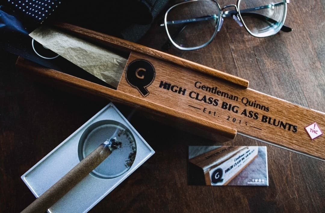 image of a a case that reads high class big ass blunts with glasses next to the case