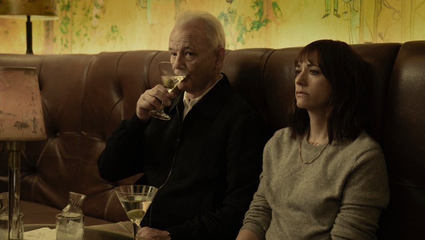 Bill Murray and Rashida Jones drink martinis at a bar