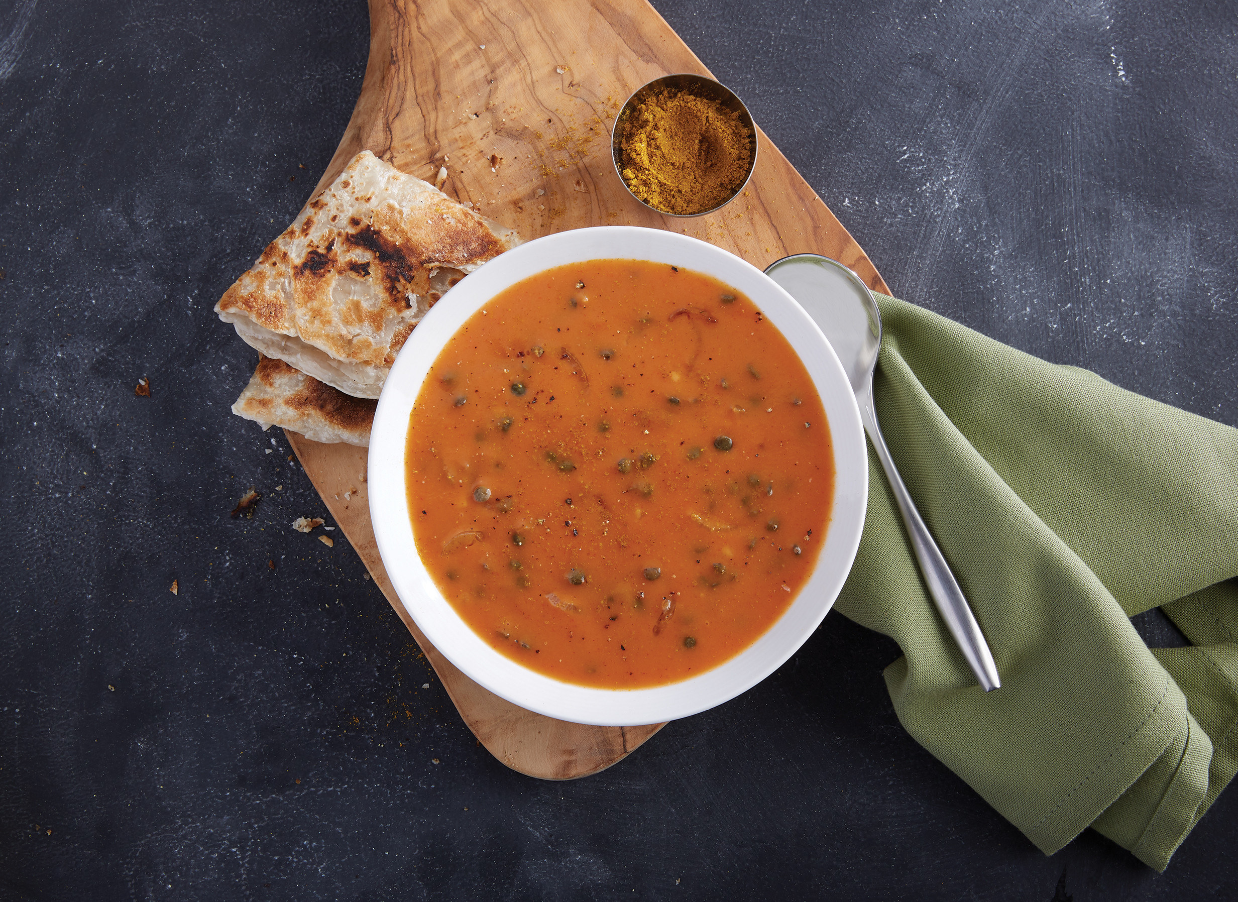 Coconut curry lentil soup with naan