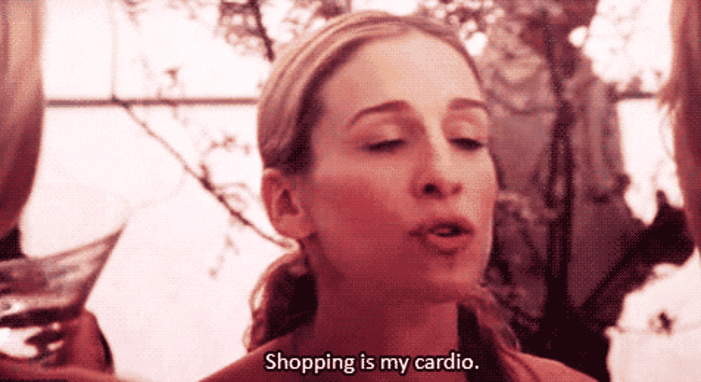 a gif of carrie bradshaw saying &quot;shopping is my cardio&quot;