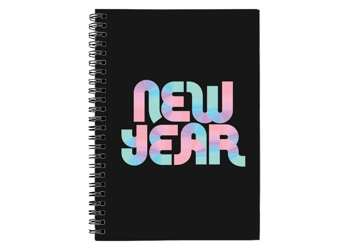 Black spiral notebook with &quot;new year&quot; written on it in pink, purple, blue and green tie dye font
