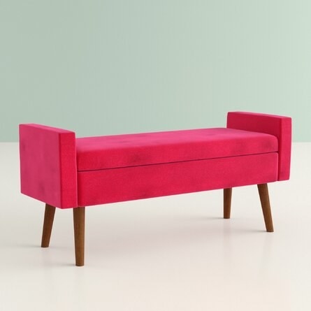 A bright pink bench