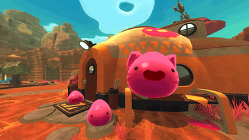 Three happy bouncing slime balls in &quot;Slime Rancher&quot;