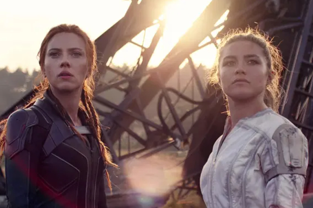 Natasha Romanoff stands next to Yelena Belova in front of some wreckage