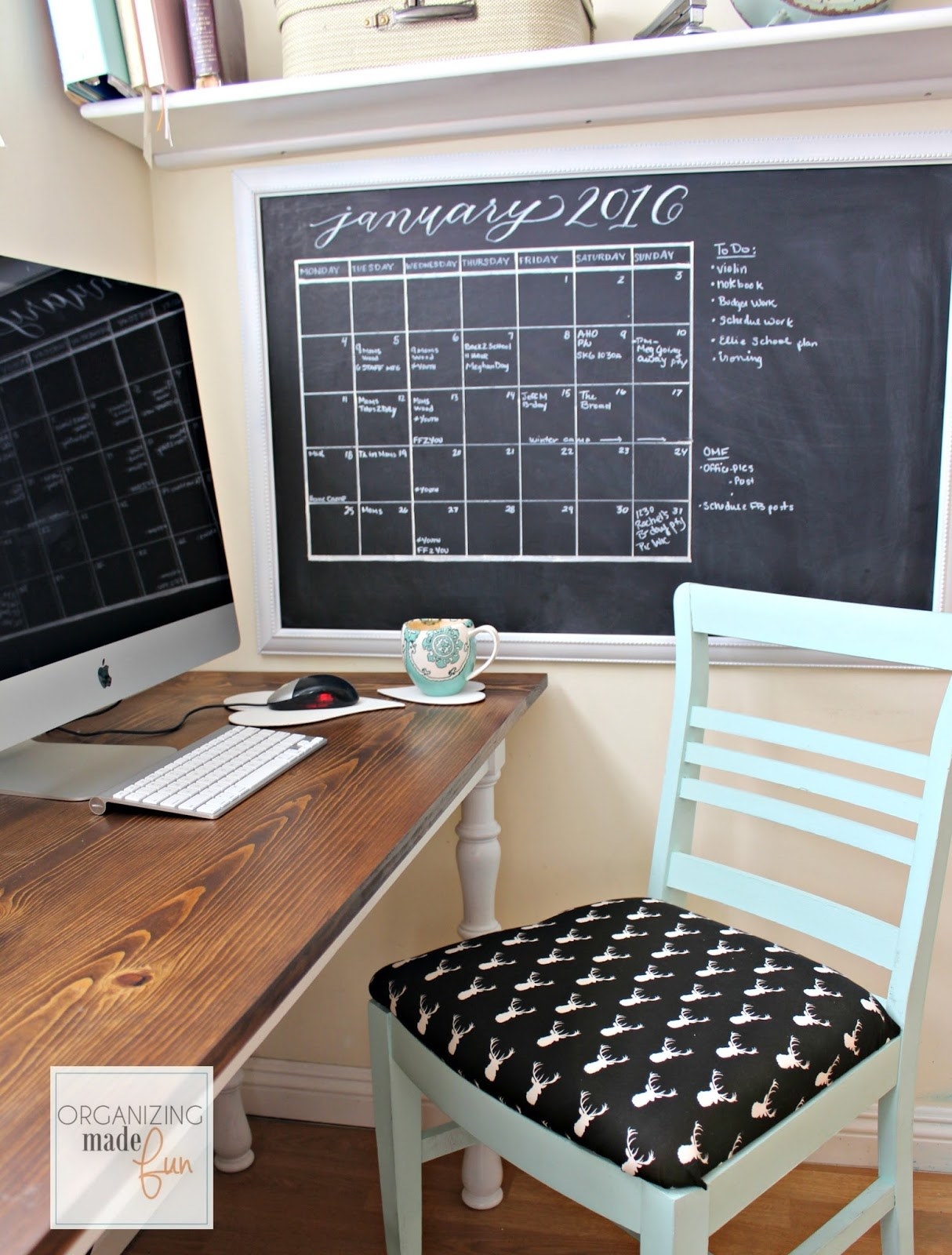blogger&#x27;s DIY chalkboard calendar next to their desk