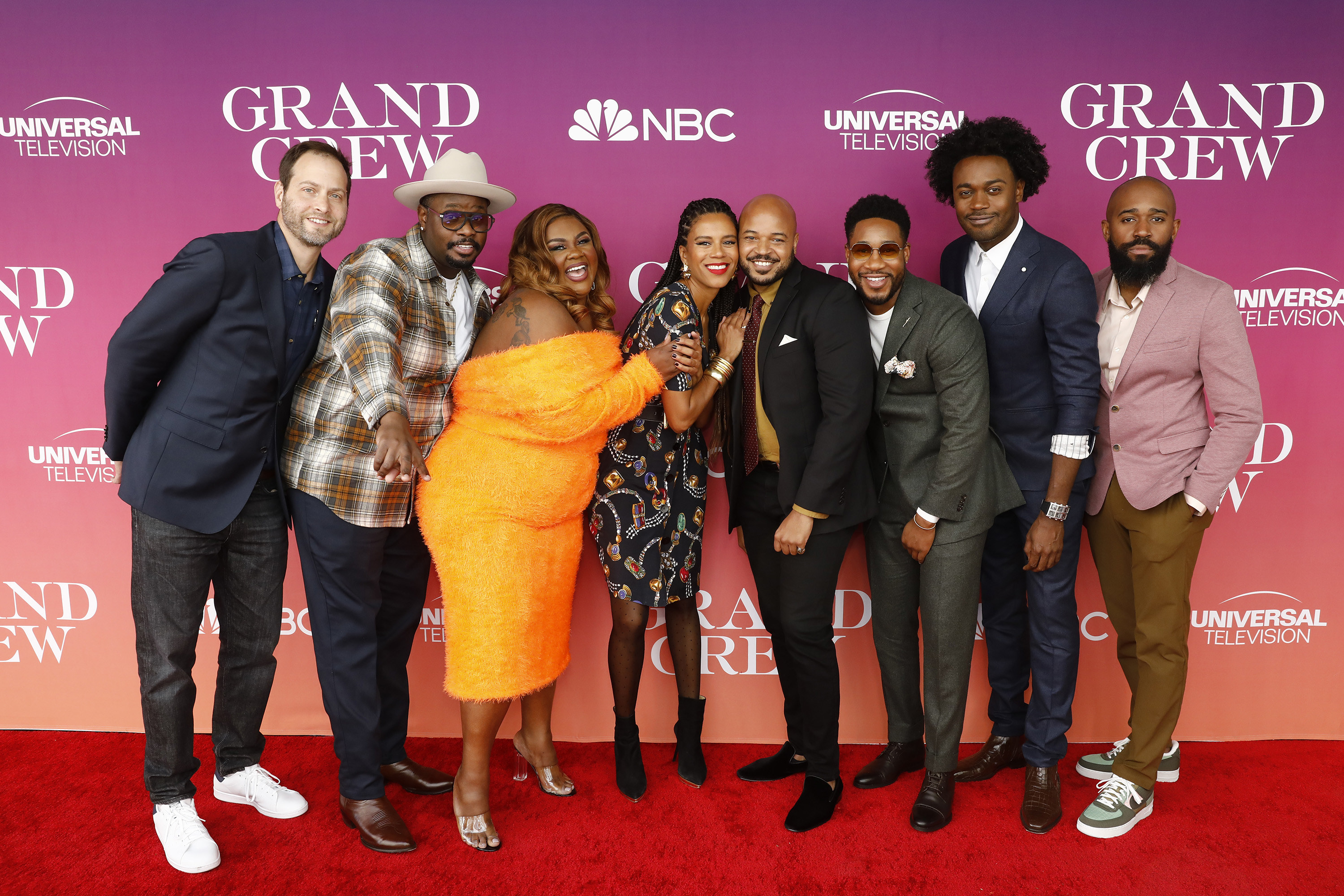 Cast and crew members of &quot;Grand Crew&quot; pose at the premiere of the show