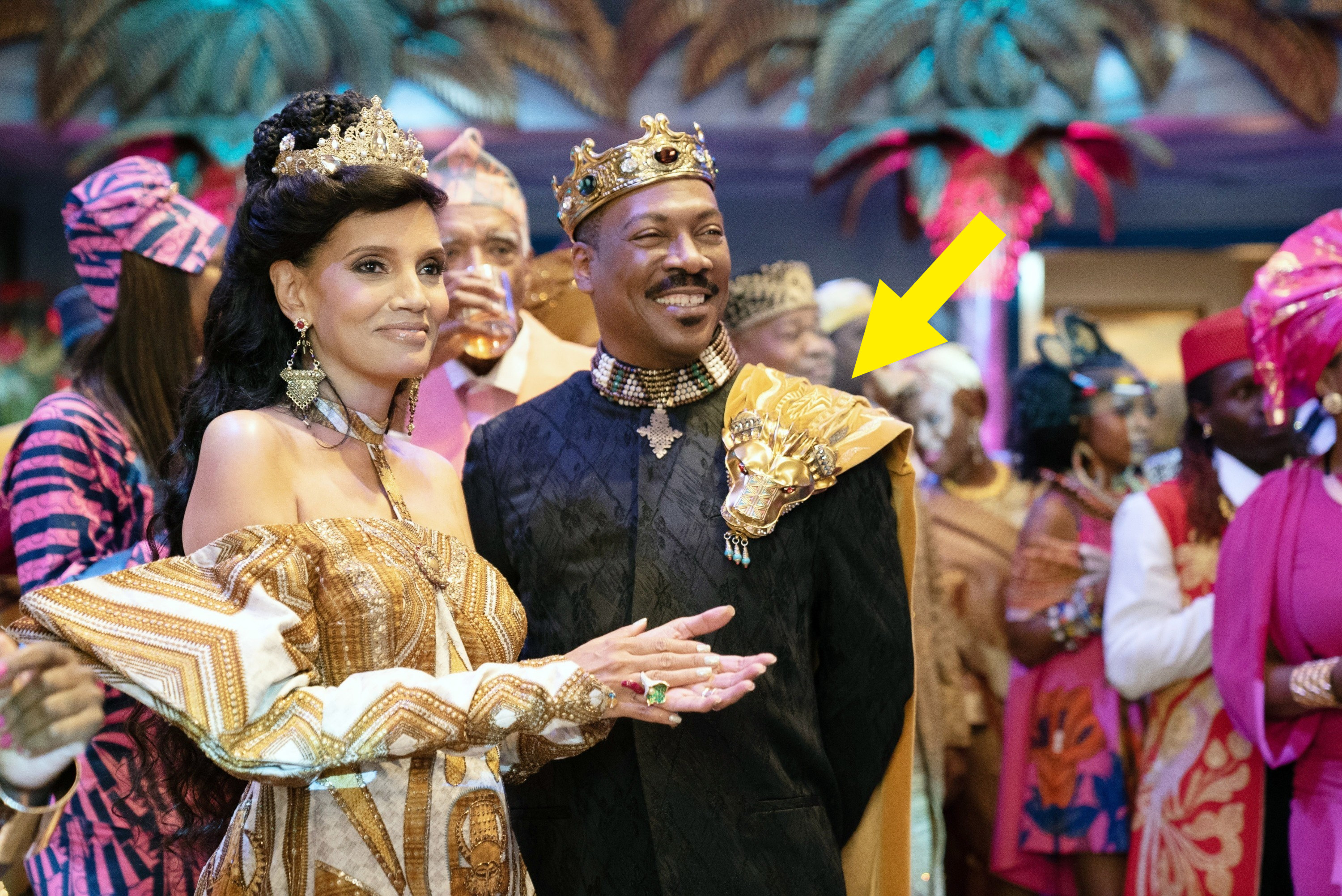Prince Akeem wearing the golden lion shoulder accessory