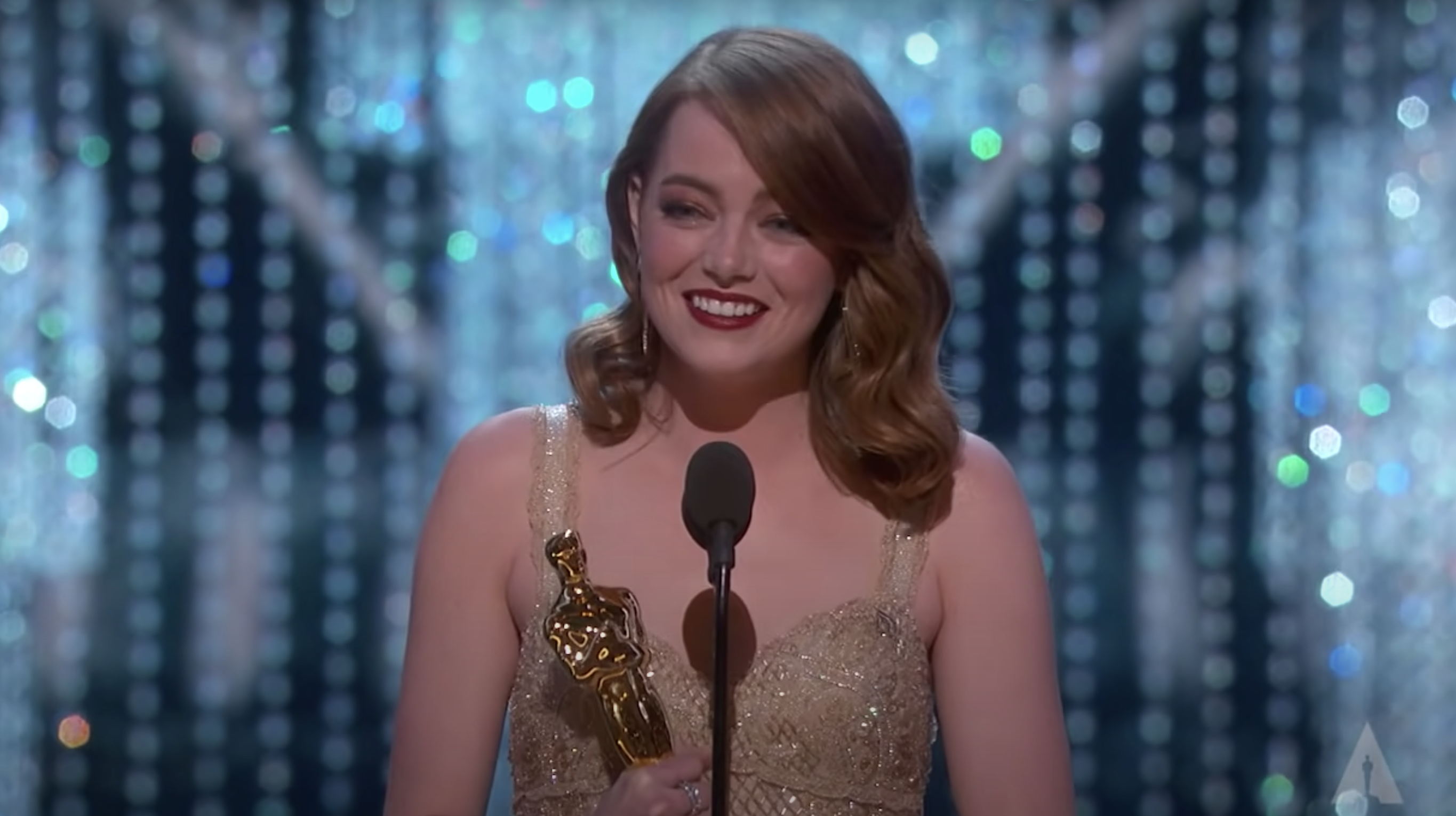 Emma accepting her Oscar