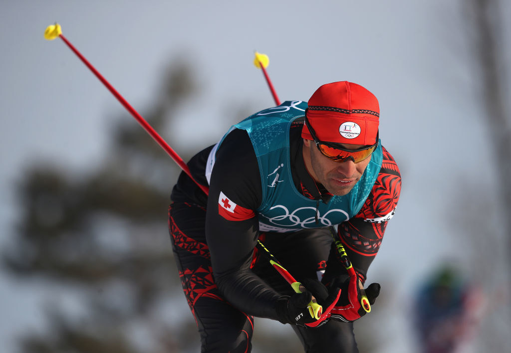 Taufatofua slides down the track in his skis