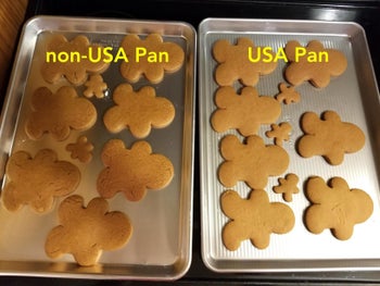 reviewer making gingerbread cookies on two different pans. The USA Pan (right) made smooth cookies and the left pan made cracked cookies
