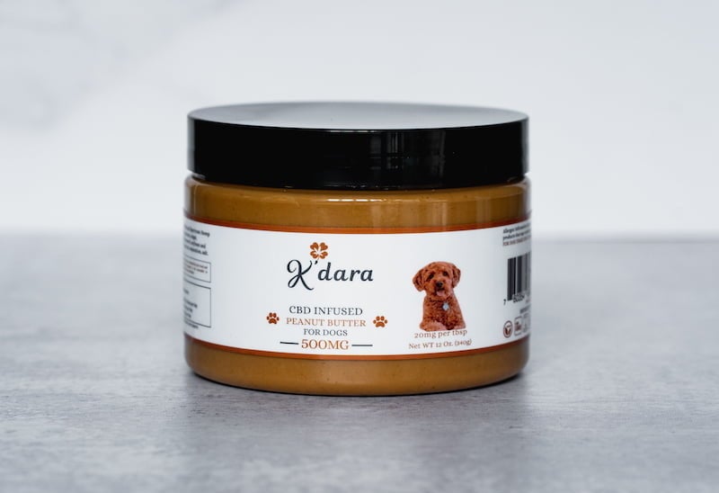 a jar of CBD-infused peanut butter for dogs