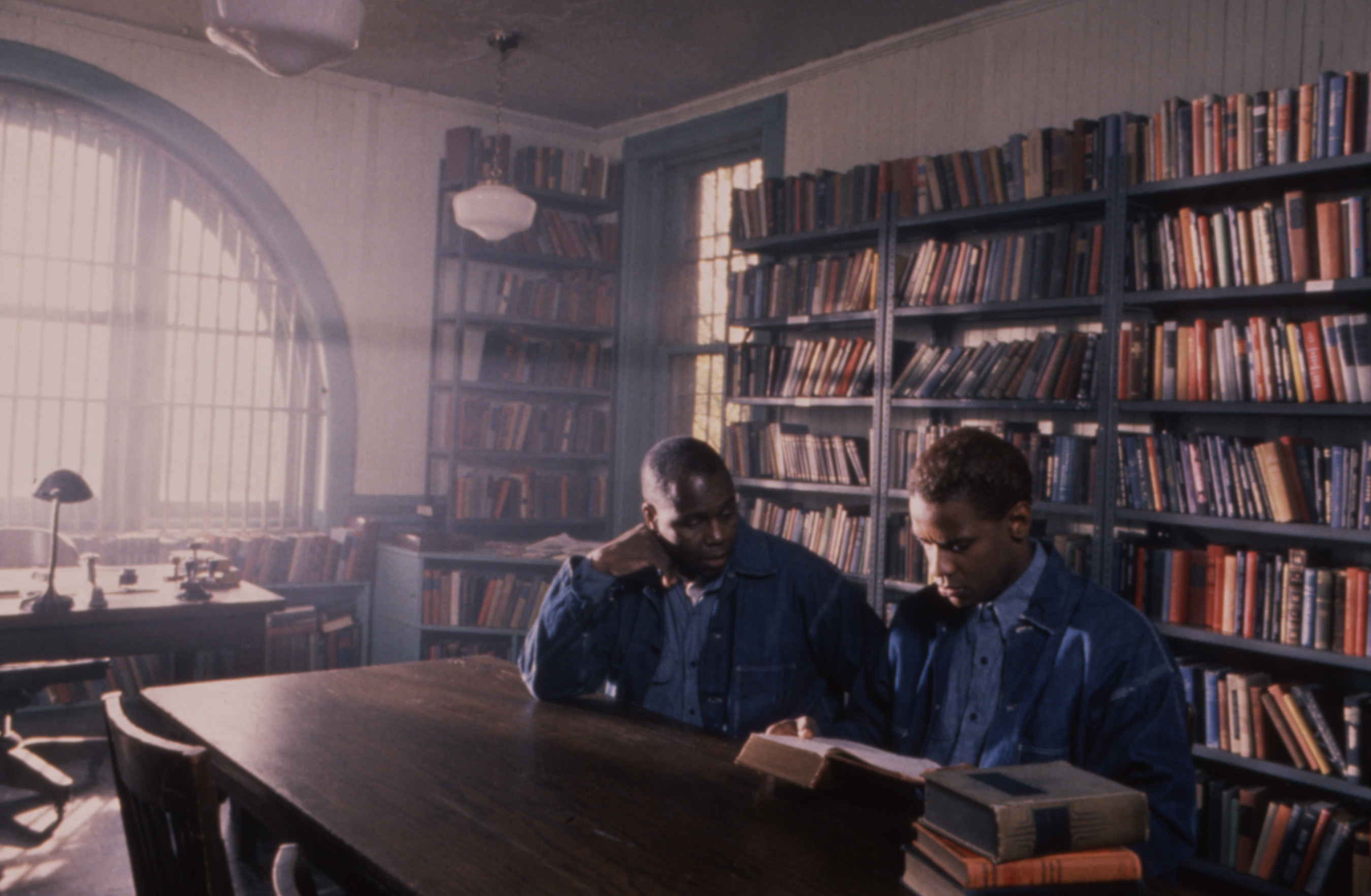 Malcolm X in a prison library