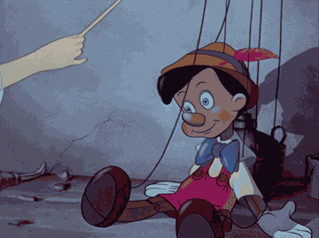 a gif of Pinocchio&#x27;s marionette strings being waved away with a magic wand