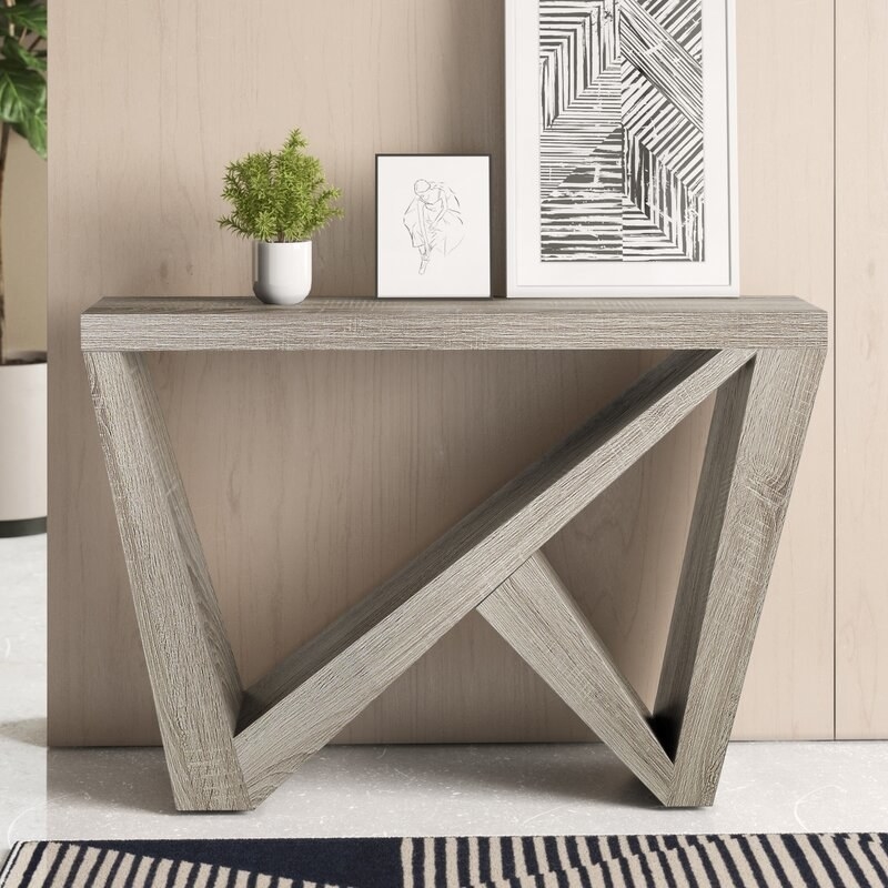the console table in grey wood