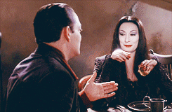 Gomez Addams kissing Morticia&#x27;s hand