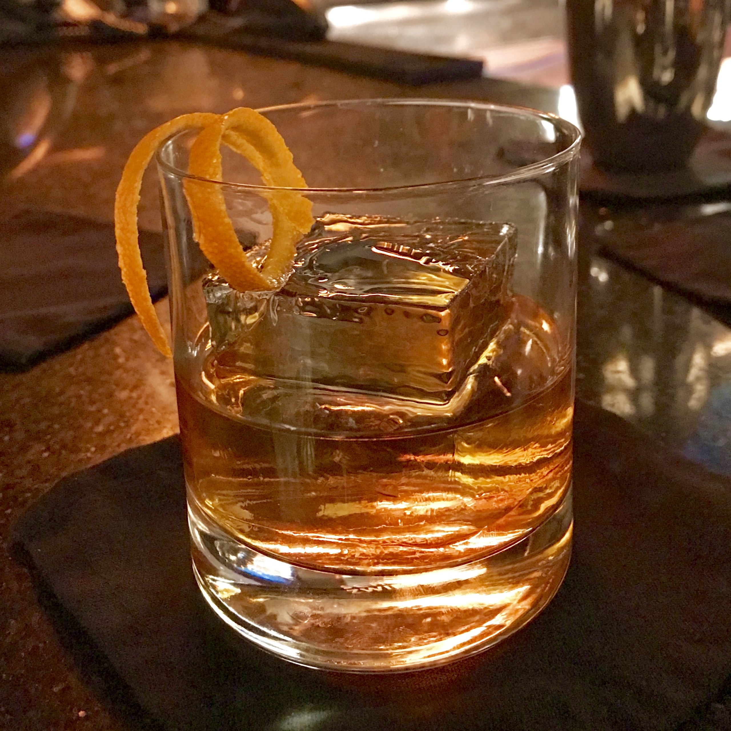 Whisky drink at bar.