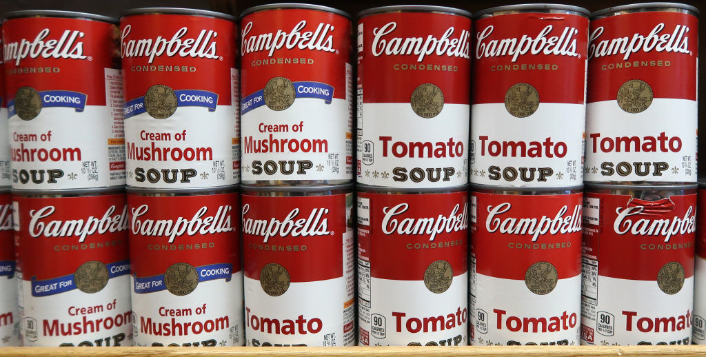 Campbell&#x27;s Soup cans on a shelf.