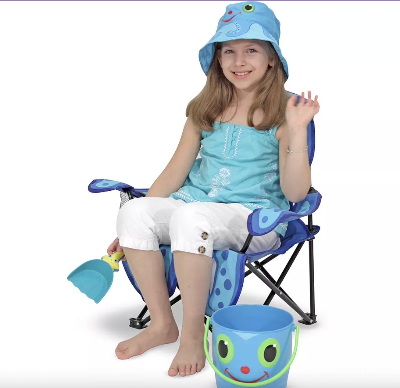 Kid sitting in camp chair