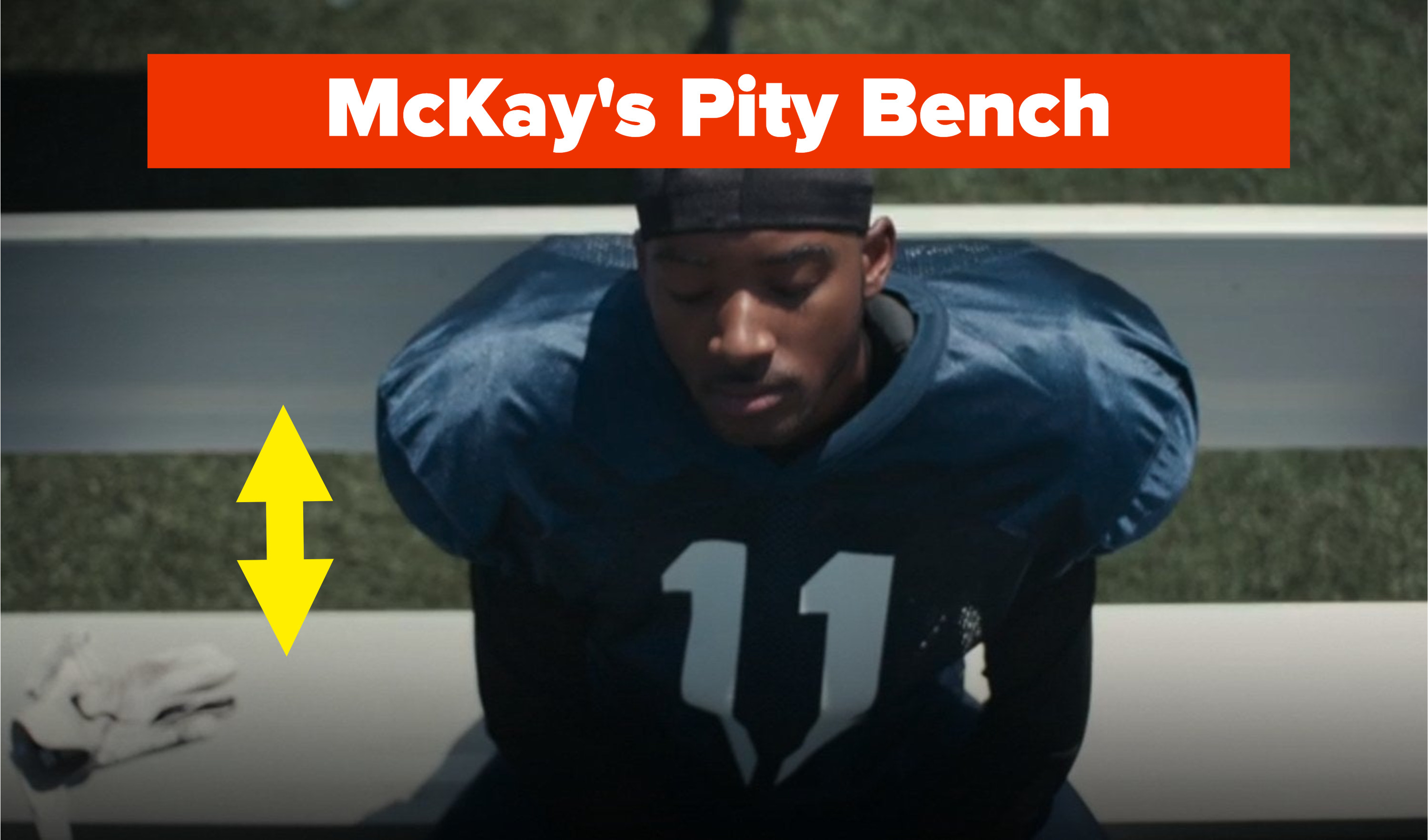 mckay sitting on a football bench