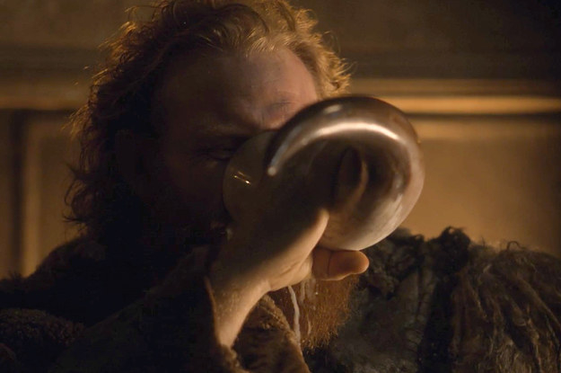 Kristofer Hivju as Tormund Giantsbane swigging a flagon of ale