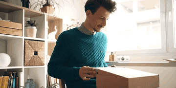 Man opens up box