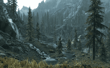A calm scene of a running waterfall in the mountainous landscape of &quot;Skyrim&quot;