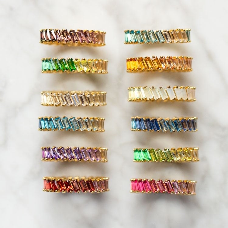 The 12 ombre birthstone rings in a line