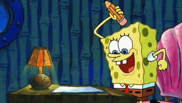 A close up of SpongeBob SqaurePants are he stabs a piece of paper with a pencil
