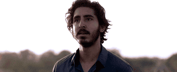 Dev Patel in Lion looks off in the distance