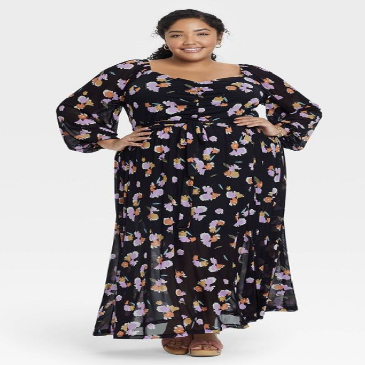 model wearing the black floral dress