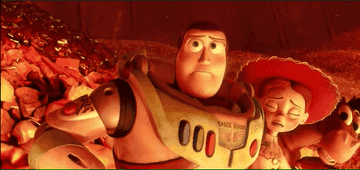 Buzz reaching for Woody inside a furnace in Toy Story 3