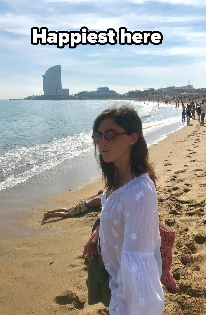 A woman on a beach in Barcelona.