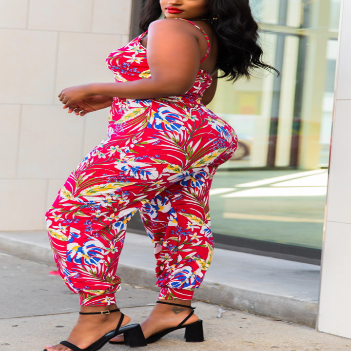 side view of model wearing the red jumpsuit