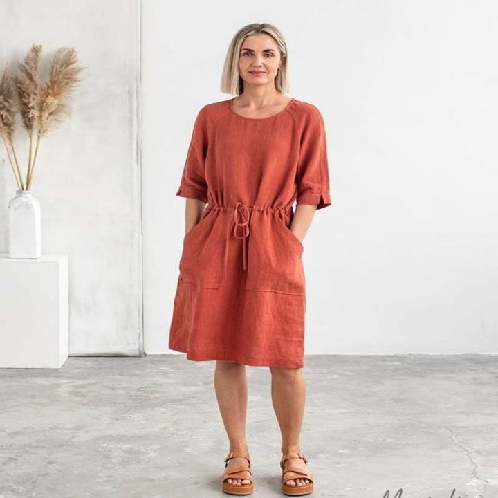 model wearing the red dress