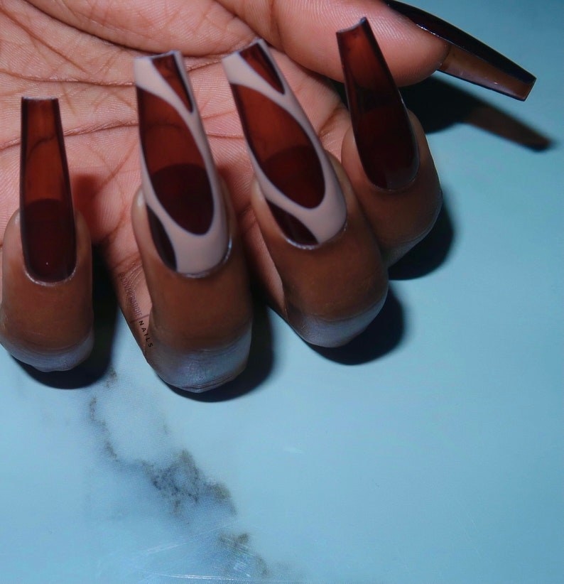 A set of brown translucent nails