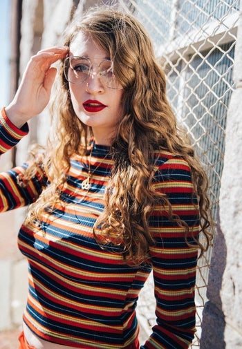 close up of reviewer wearing the striped top