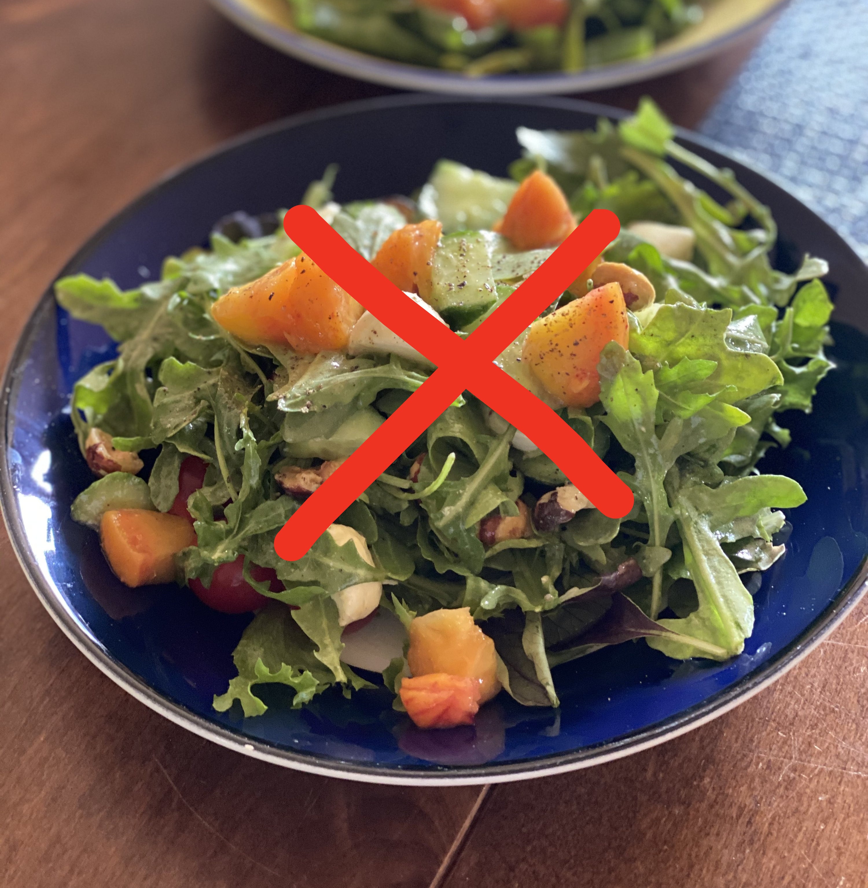 Arugula salad with an X through it