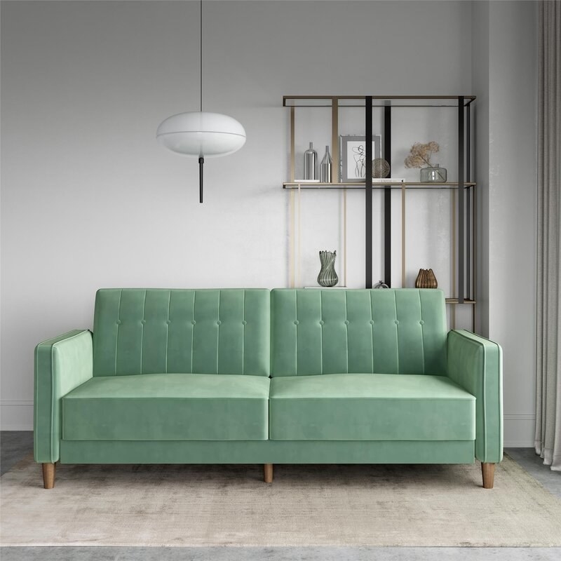 The green square arm velvet sleeper sofa