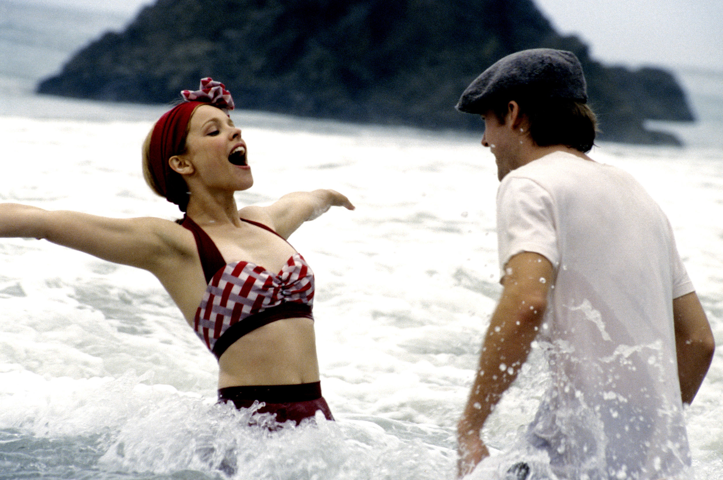Rachel McAdams and Ryan Gosling play in the ocean during a scene in &quot;The Notebook&quot;
