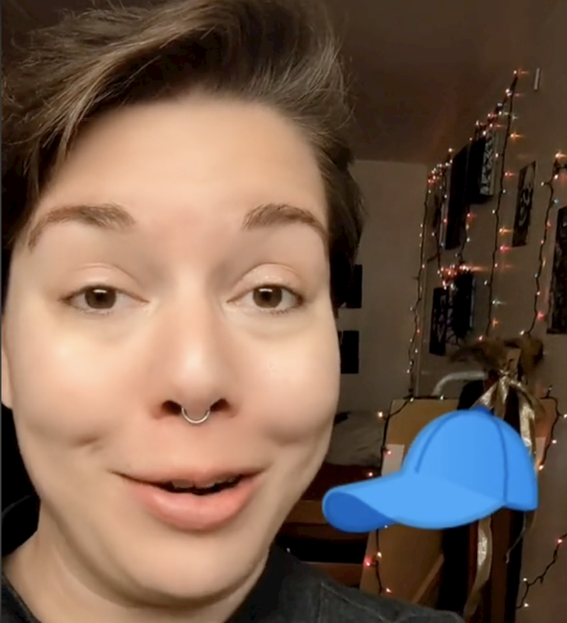 Scarlett with the blue cap emoji