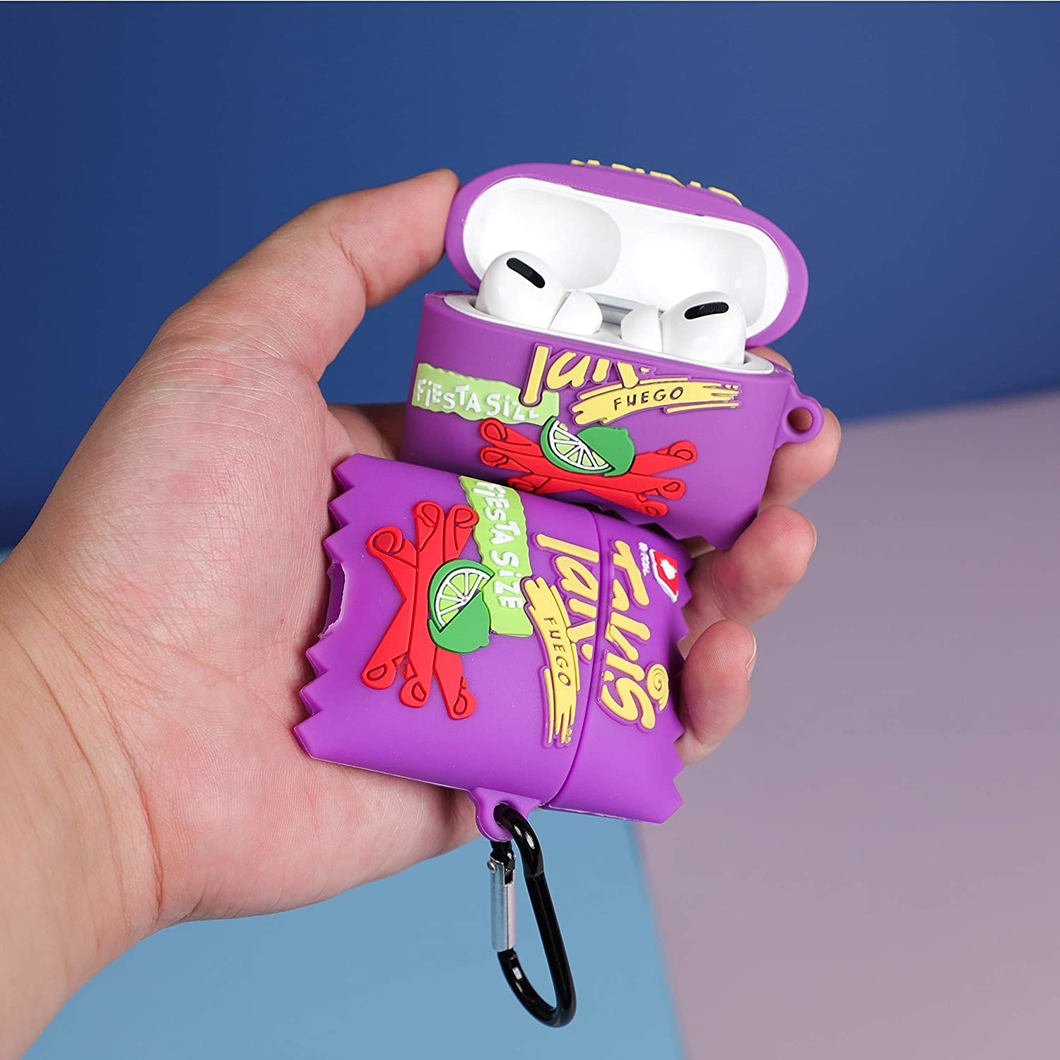 A person holding two Takis inspired AirPods cases