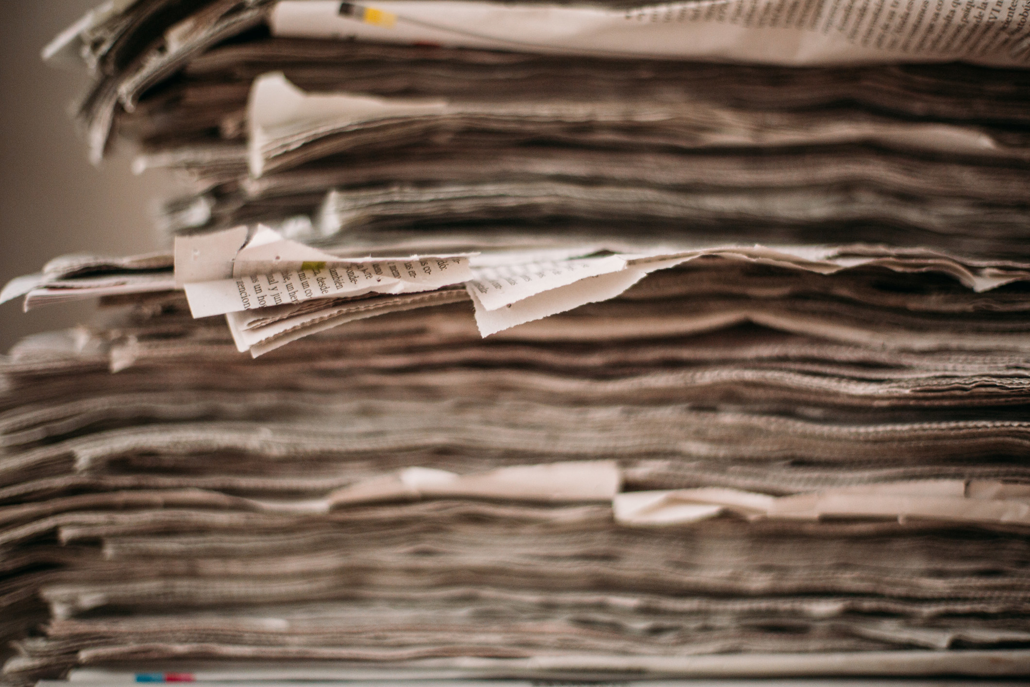 closeup of a stack of newspapers