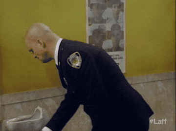 A Man Is Squirted In The Face By A Fountain Of Ranch