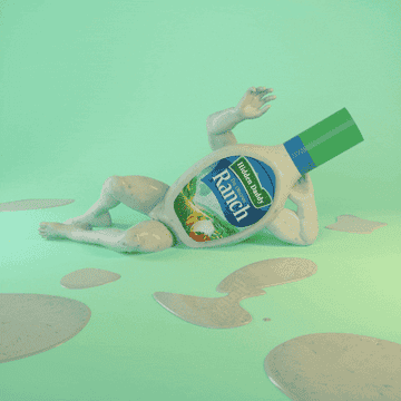 A Bottle Of Ranch Is Lying Down And Waving