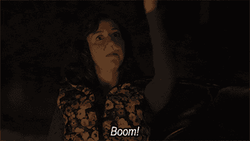 A woman saying, &quot;boom!&quot;