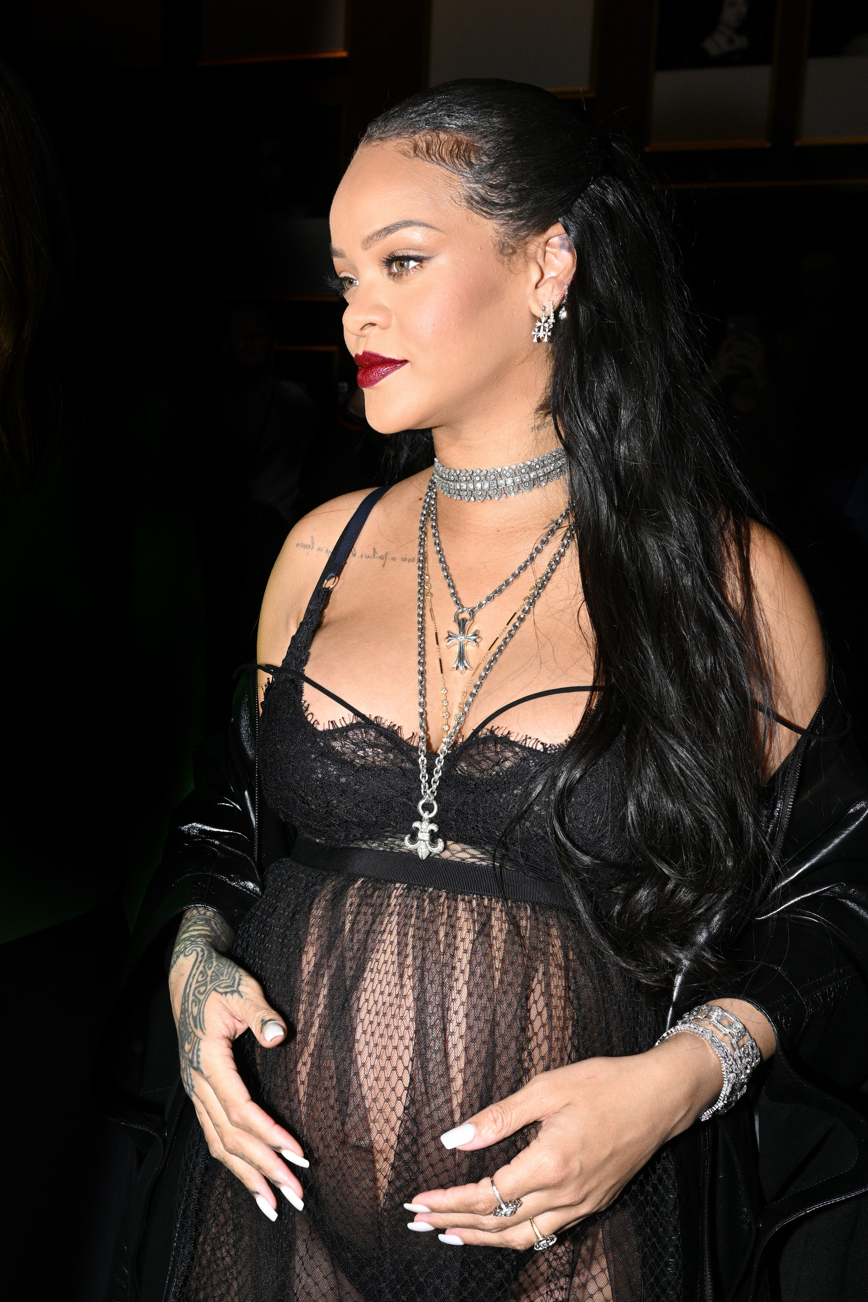 Pregnant Rihanna poses in black lingerie to celebrate brand's fifth  anniversary