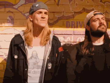 gif of jay and silent bob in clerks happily bobbing their heads from side to side in unison