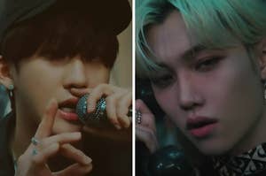 Two Stray Kids members are singing in a music video